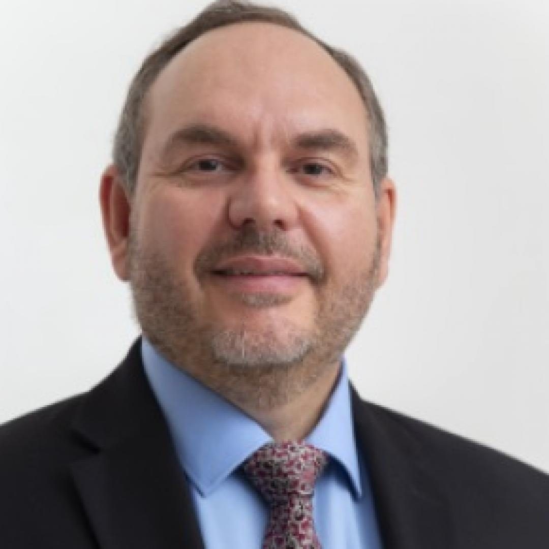 Dr. Gil Facina